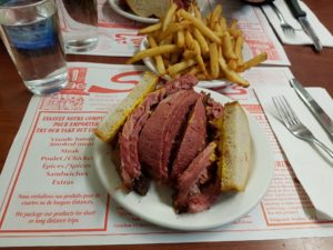 CryoDragon having Montreal Smoked Meat at Schwartzs in Quebec